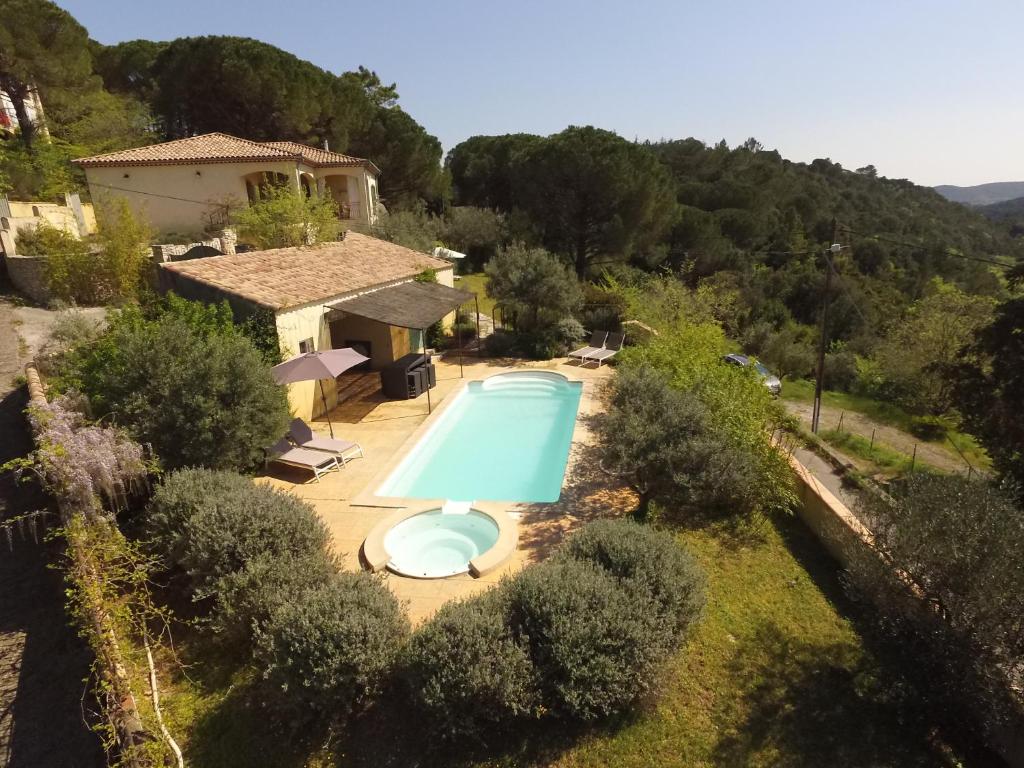 an aerial view of a villa with a swimming pool at La Villa Bellevue Anduze in Anduze
