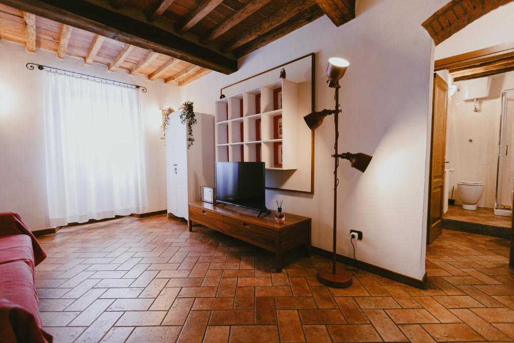 TV a/nebo společenská místnost v ubytování Al Borgo 153 Apartment