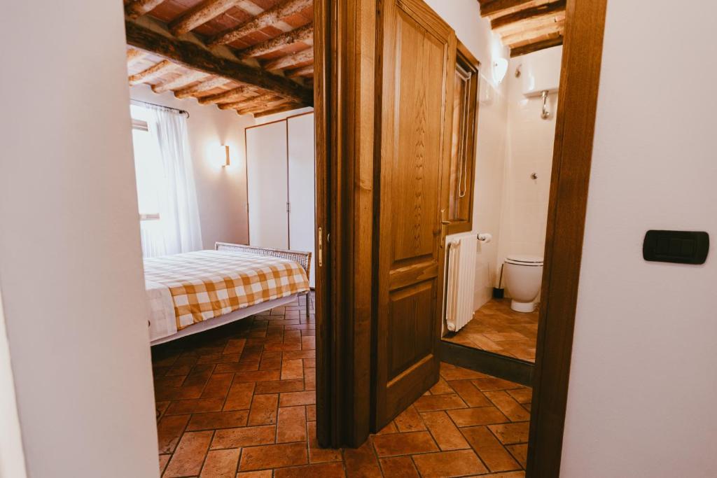 Postel nebo postele na pokoji v ubytování Al Borgo 153 Apartment