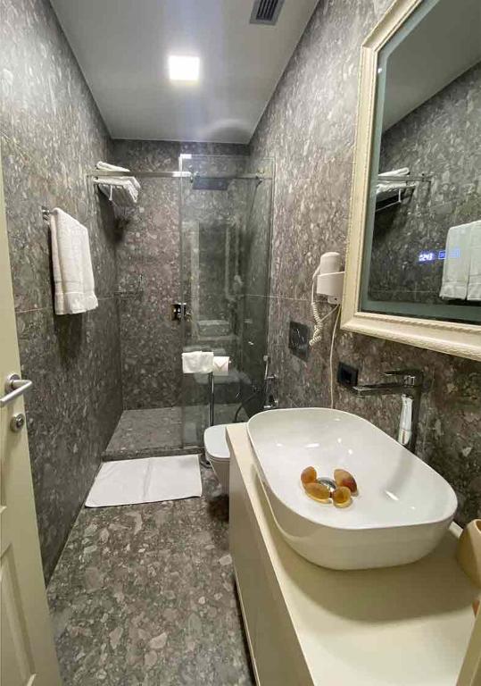 Koupelna v ubytování Le prince Rooms
