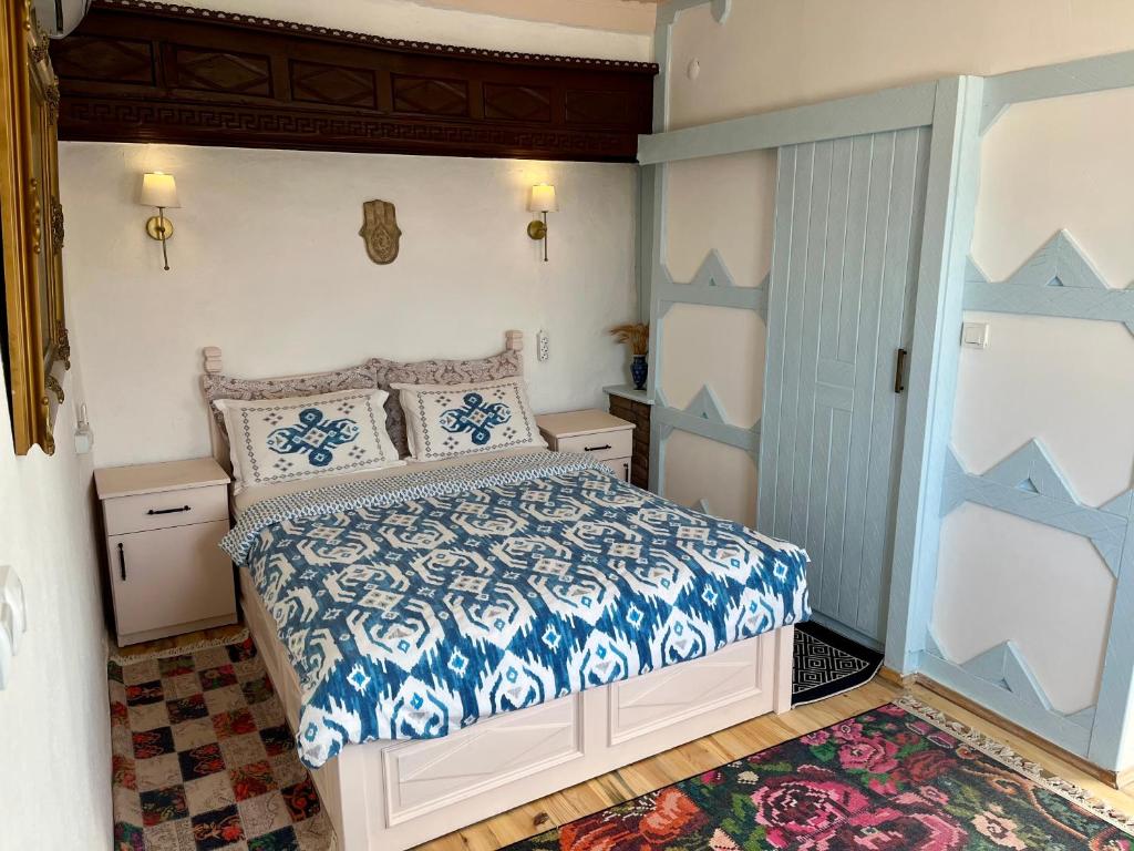 A bed or beds in a room at Mystic Konak