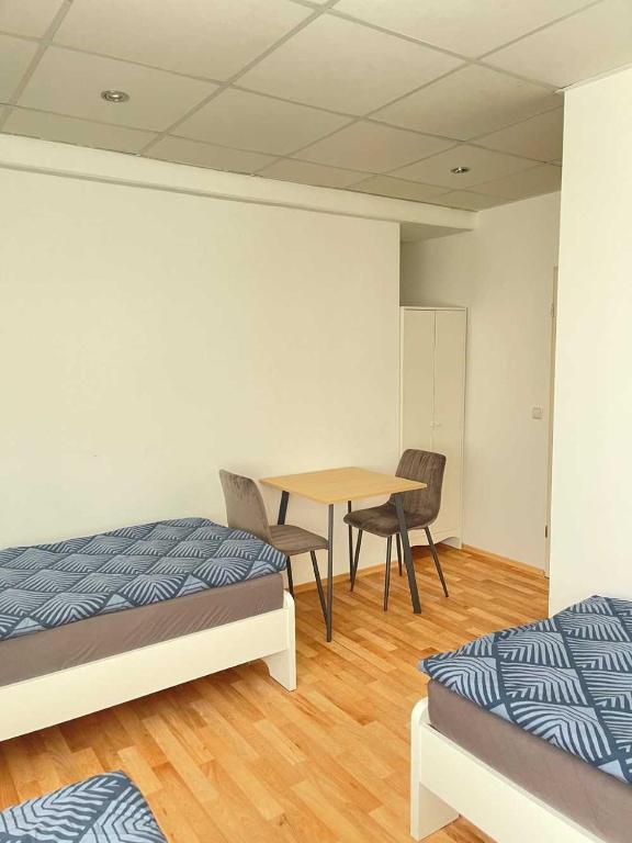 Postel nebo postele na pokoji v ubytování Apartments Haar