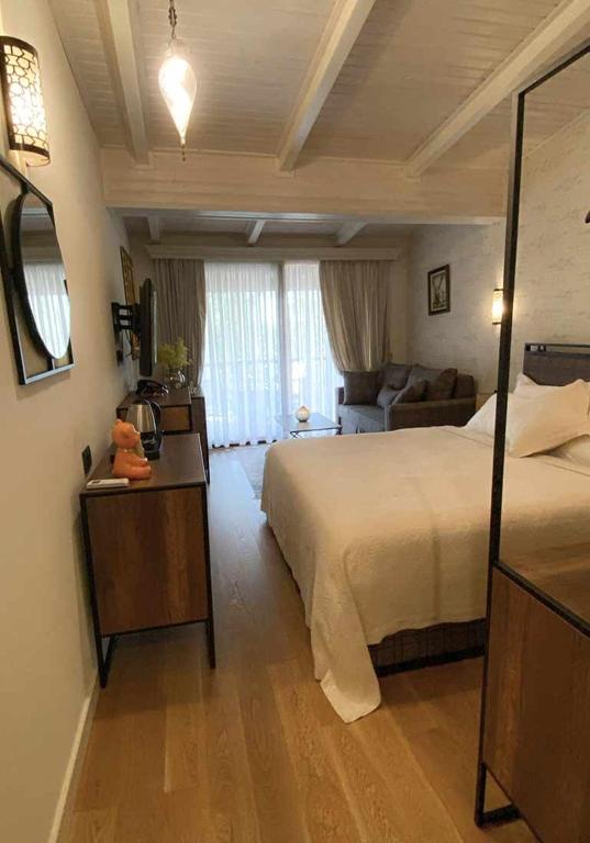 Postel nebo postele na pokoji v ubytování Le prince Rooms