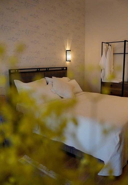 Postel nebo postele na pokoji v ubytování Le prince Rooms