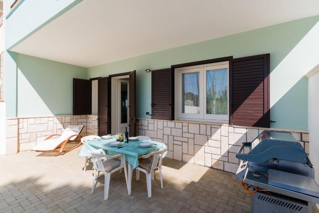 Posezení v ubytování Intera casa ad uso esclusivo con 3 camere 2 bagni giardino wifi parcheggio lavatrice microonde barbecue macchina caffè
