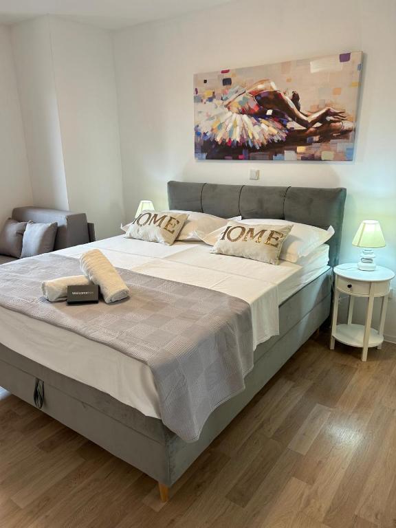 Posteľ alebo postele v izbe v ubytovaní Apartmani Vujić- Villa Dolac