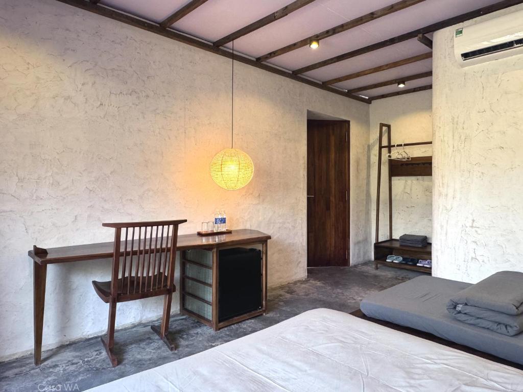 Postel nebo postele na pokoji v ubytování CasaWa Homestay Hue
