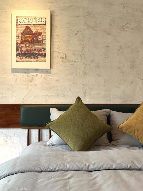 Postel nebo postele na pokoji v ubytování CasaWa Homestay Hue