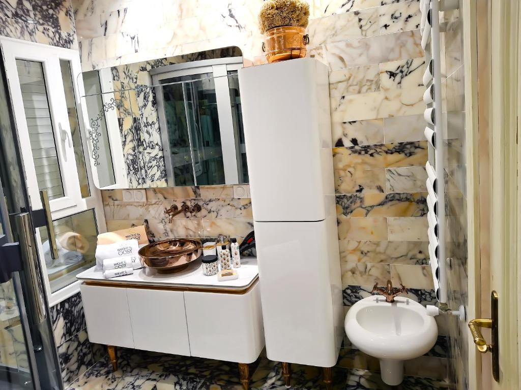 Koupelna v ubytování L'Orchidée - Suites de Luxe avec Piscine Chauffée et Vue sur le Lac de Tunis