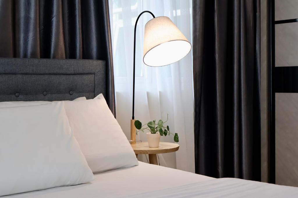 Kuching Town - RiverBed - Luxury Resort Condo客房内的一张或多张床位