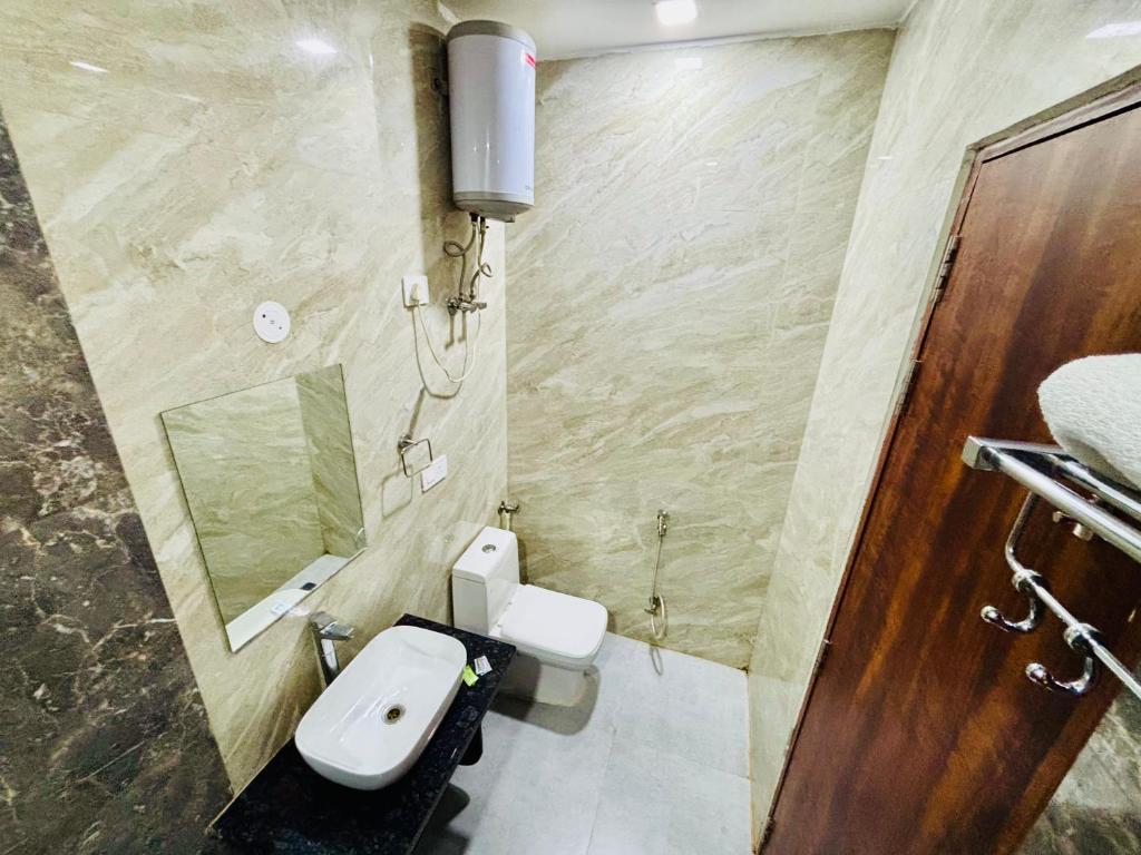 Koupelna v ubytování Hotel Ganga Palace - Agra Dasaprakash Restuarant