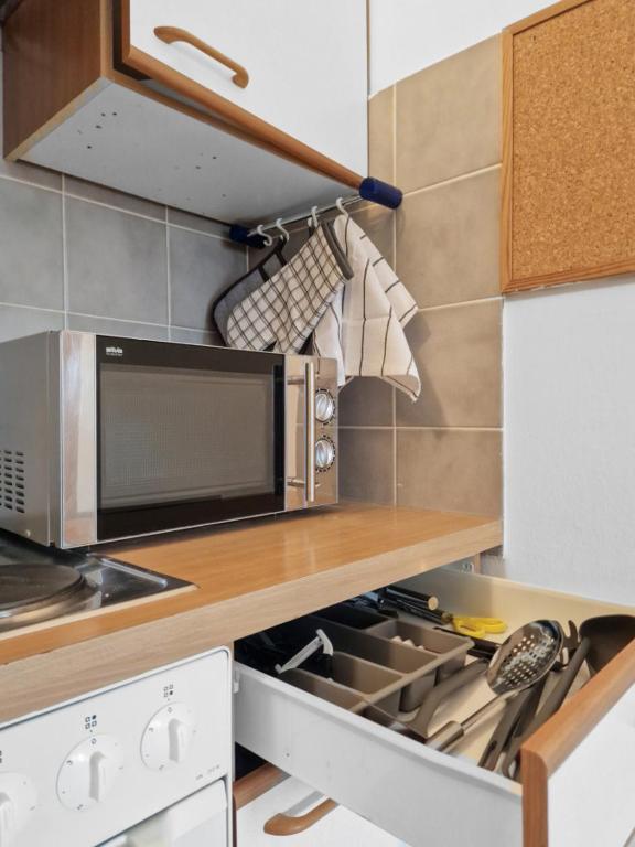 Kuchyň nebo kuchyňský kout v ubytování Sparkassa Stockerau