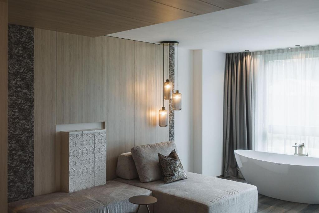 Postel nebo postele na pokoji v ubytování Alpinhotel Keil