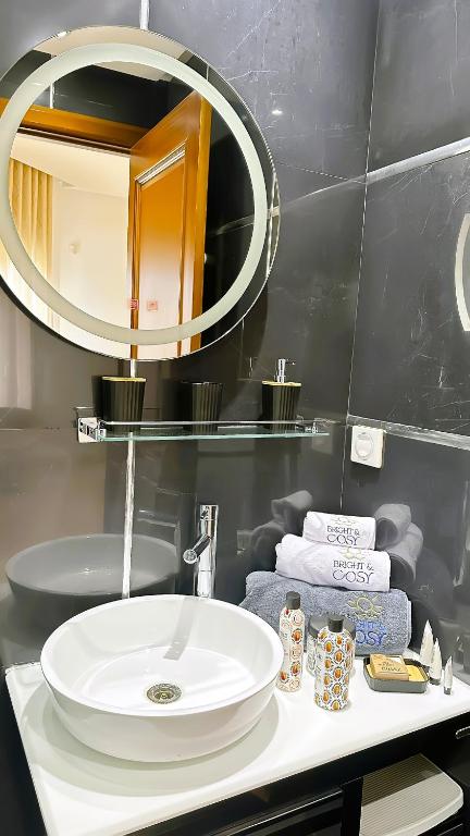 Koupelna v ubytování L'Orchidée - Suites de Luxe avec Piscine Chauffée et Vue sur le Lac de Tunis