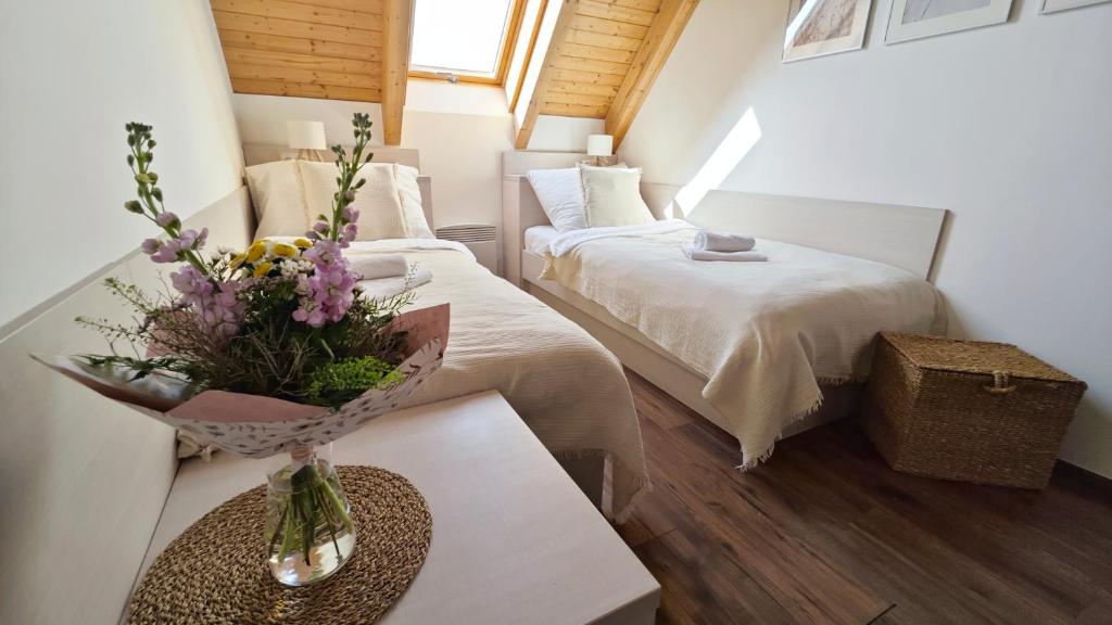 Postel nebo postele na pokoji v ubytování Apartmán NIKI Apollon Resort Lednice