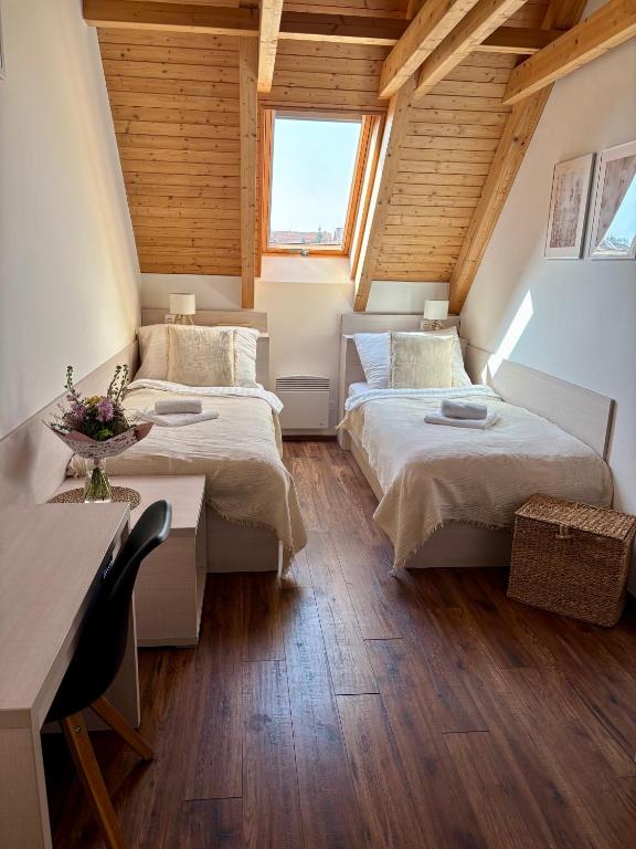 Postel nebo postele na pokoji v ubytování Apartmán NIKI Apollon Resort Lednice