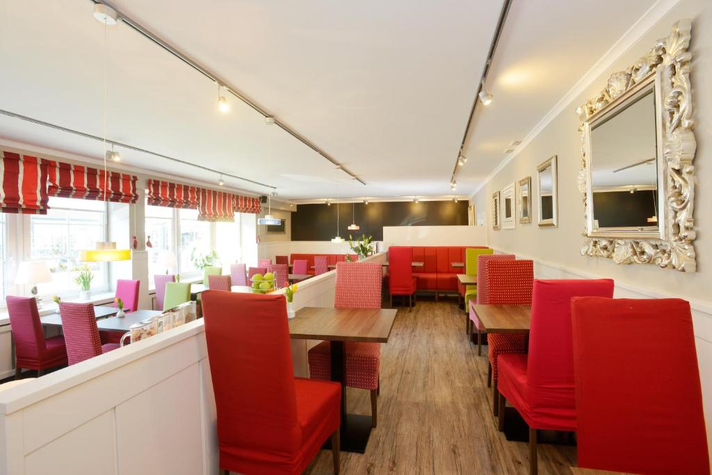 Posezení v ubytování Hotel Dünenburg