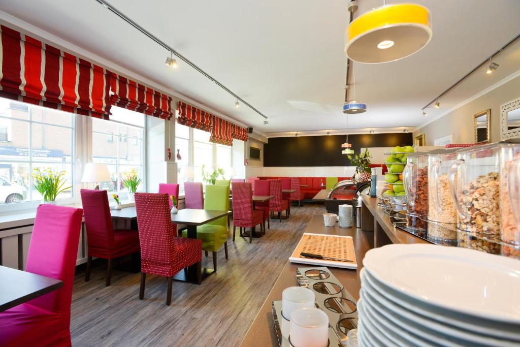 Posezení v ubytování Hotel Dünenburg