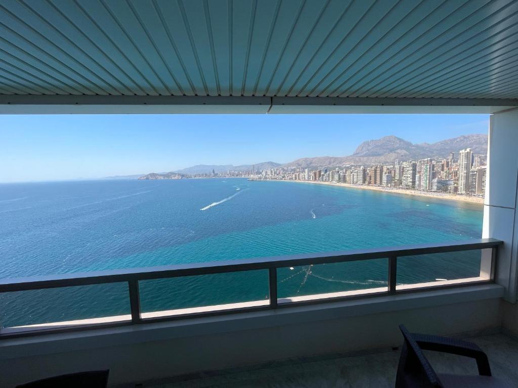 a view of the ocean from a balcony at Apartamentos Benivistas in Benidorm