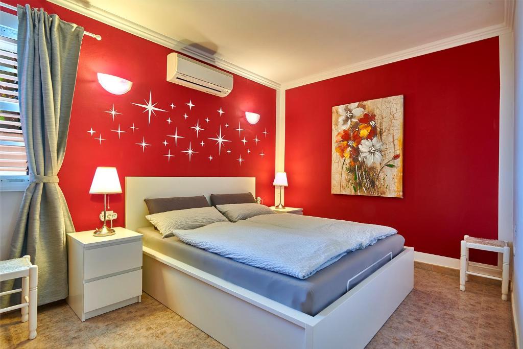 Postel nebo postele na pokoji v ubytování Apartment Romero