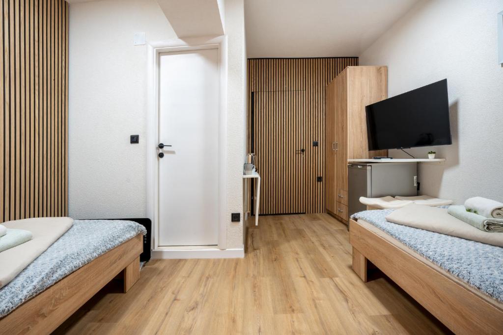 Posteľ alebo postele v izbe v ubytovaní Apartments Villa Sol