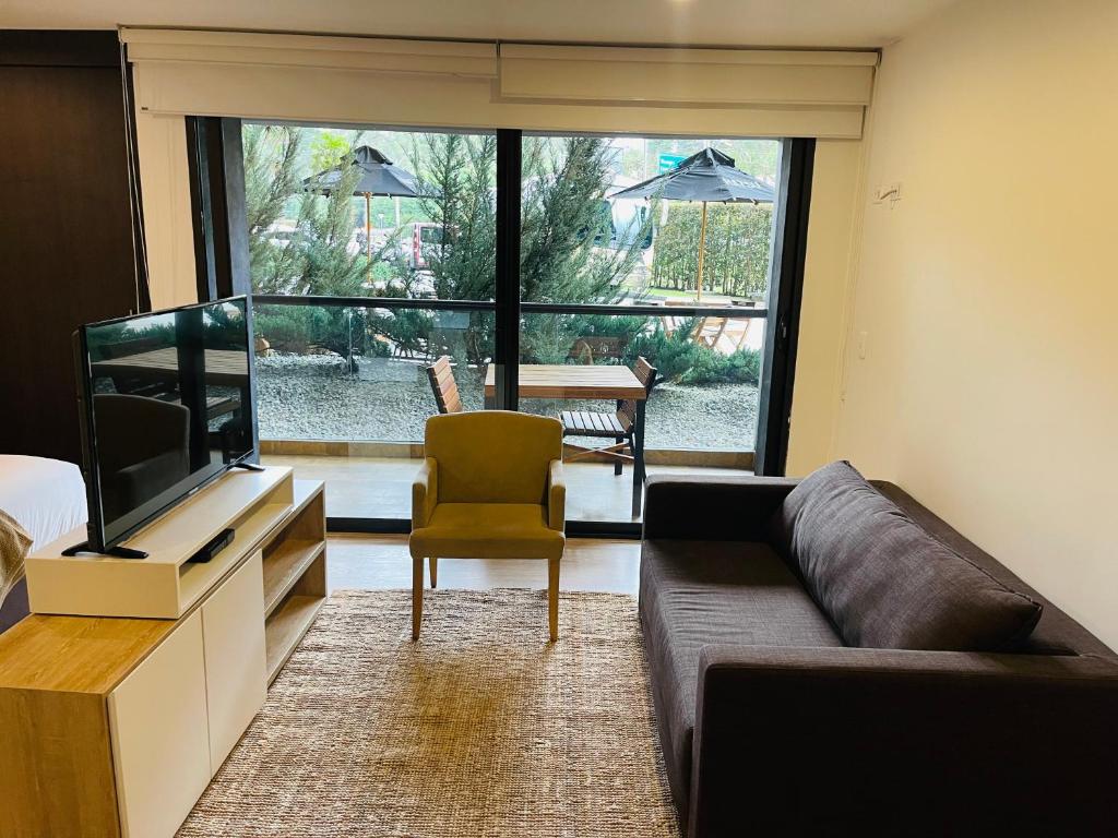 Posezení v ubytování Suite Rioverde Hotel Rionegro