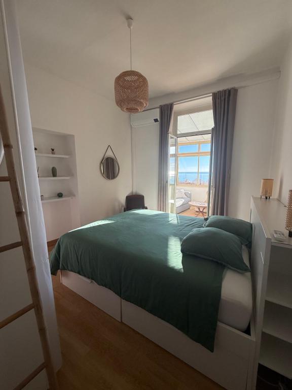 Posteľ alebo postele v izbe v ubytovaní Frontiere de Monaco 3 Pieces Vue Mer