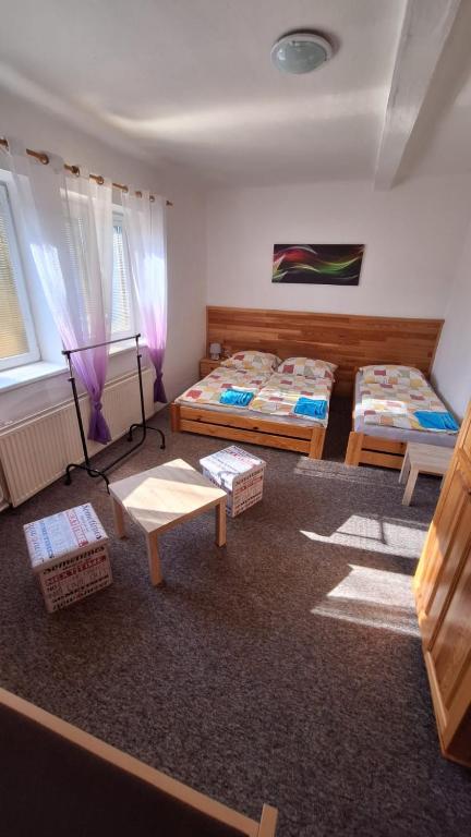 Postel nebo postele na pokoji v ubytování Park Penzion