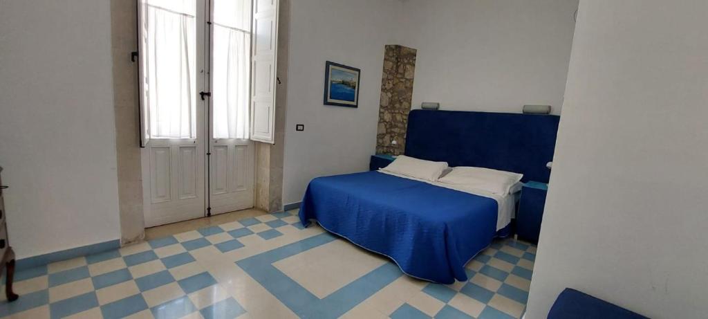 Postel nebo postele na pokoji v ubytování Lakkios charming suites and rooms