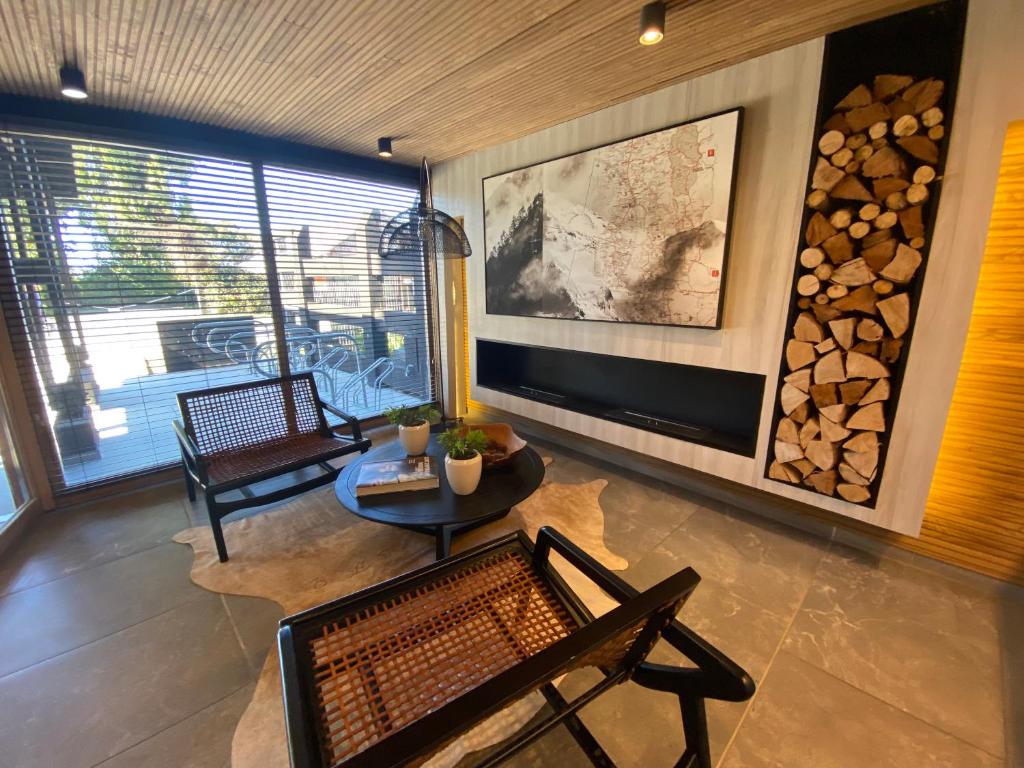 Posezení v ubytování Dpto costero vista al lago, piscina y jacuzzi