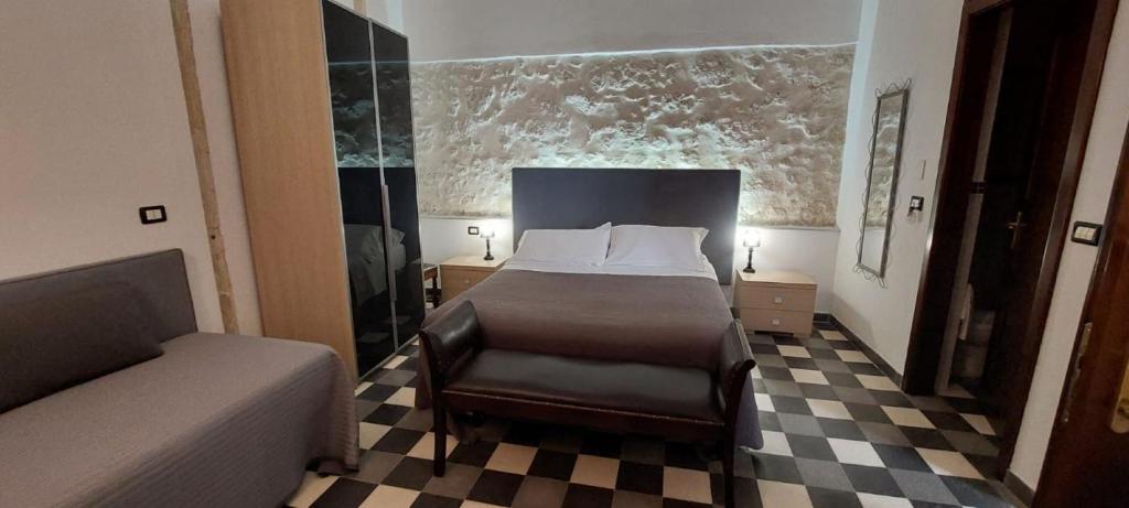 Postel nebo postele na pokoji v ubytování Lakkios charming suites and rooms