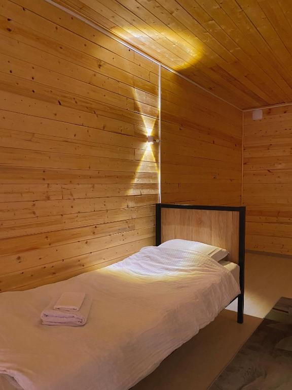 Postel nebo postele na pokoji v ubytování Bai Hotel