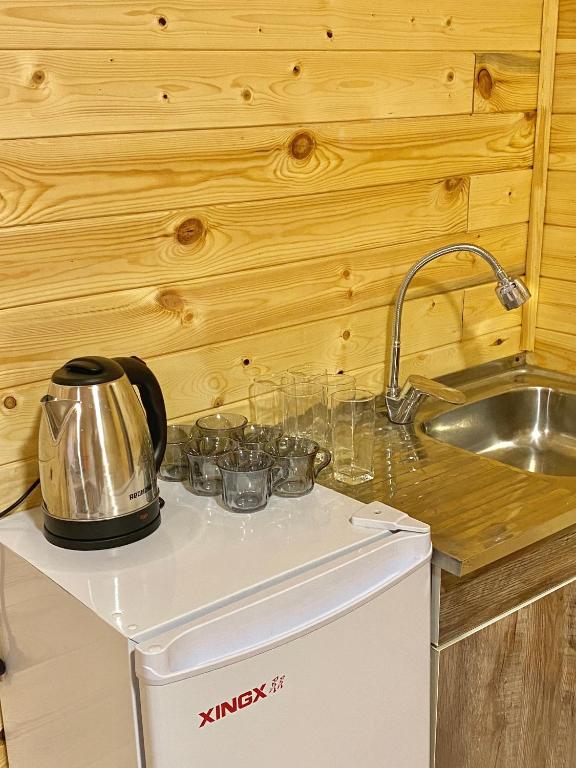 Kuchyň nebo kuchyňský kout v ubytování Bai Hotel