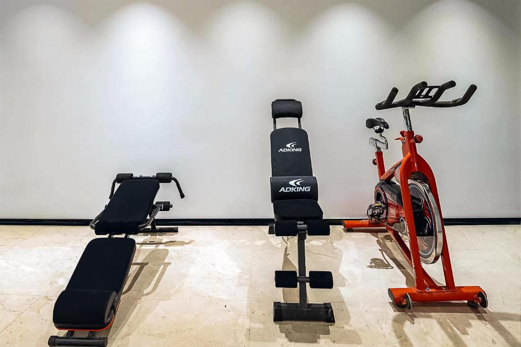Fitness centrum a/nebo fitness zařízení v ubytování Yurong West Lake Cottage Resort Hotel Hangzhou