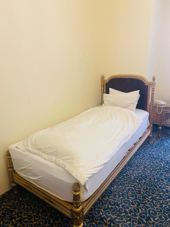 Postel nebo postele na pokoji v ubytování Hotel TanenHof
