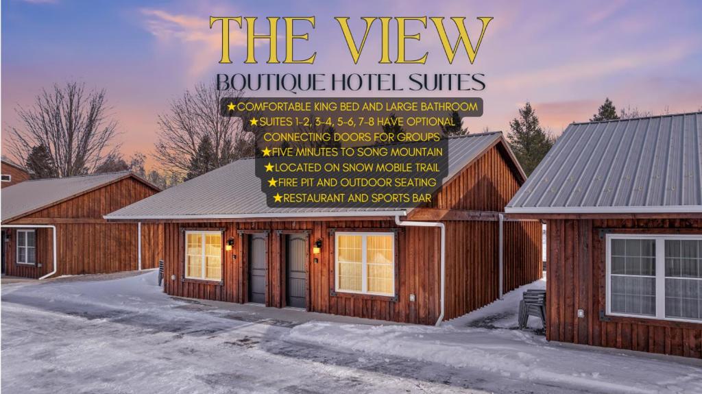 a building with a sign that reads the view boutique hotel suites at The View Boutique Hotel Suites in Tully
