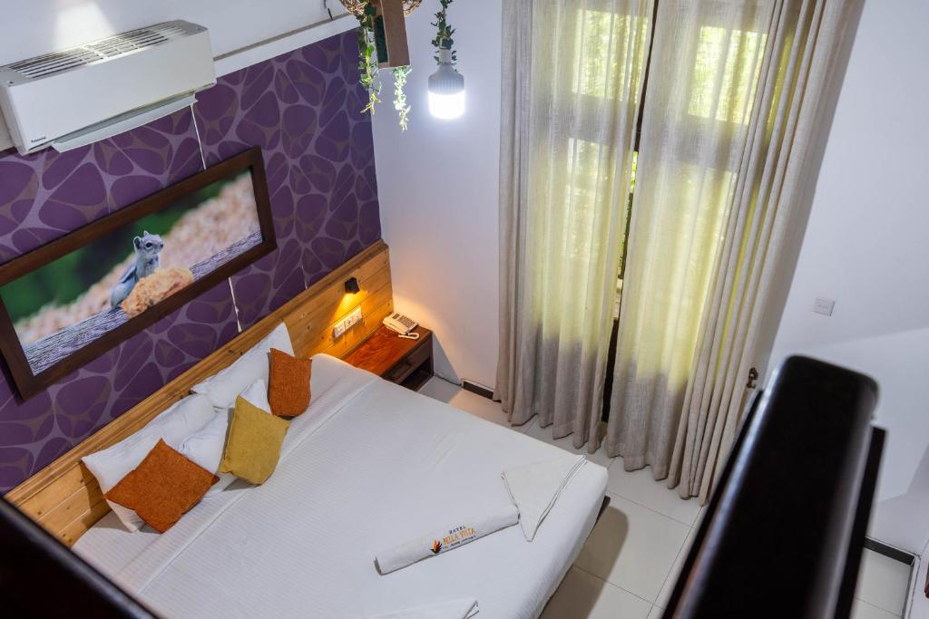 Postel nebo postele na pokoji v ubytování Hotel Bella Vista