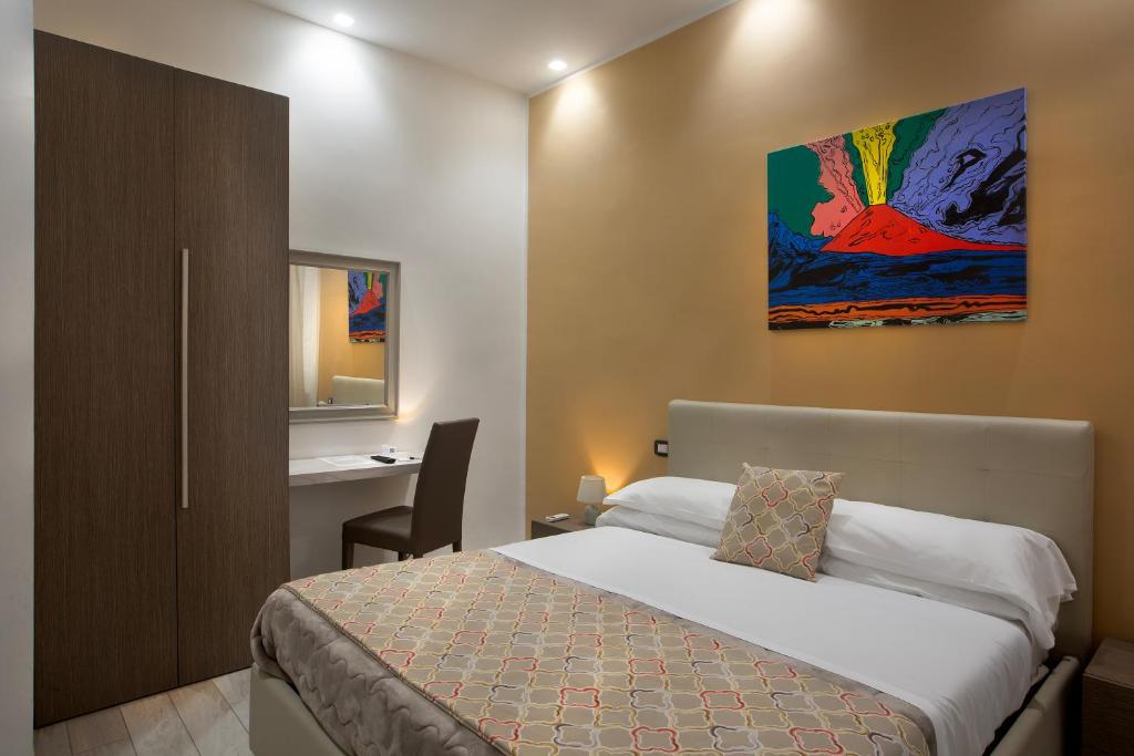 Ένα ή περισσότερα κρεβάτια σε δωμάτιο στο Residenza Suarez