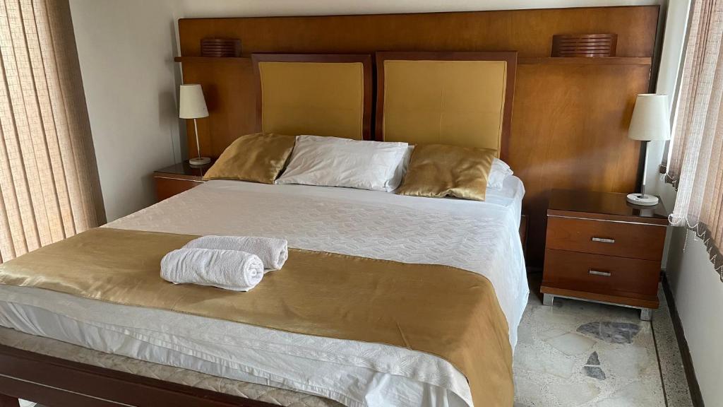 Postel nebo postele na pokoji v ubytování Casa Castillo Cali