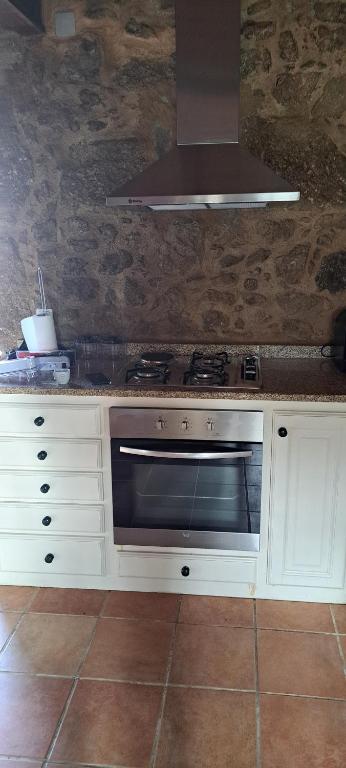 Kuchyň nebo kuchyňský kout v ubytování Refugio dos Cartolas