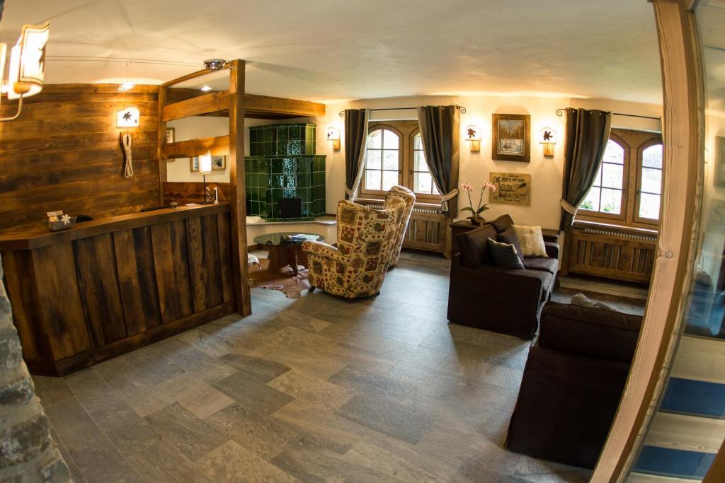 Posezení v ubytování Hotel Les Montagnards