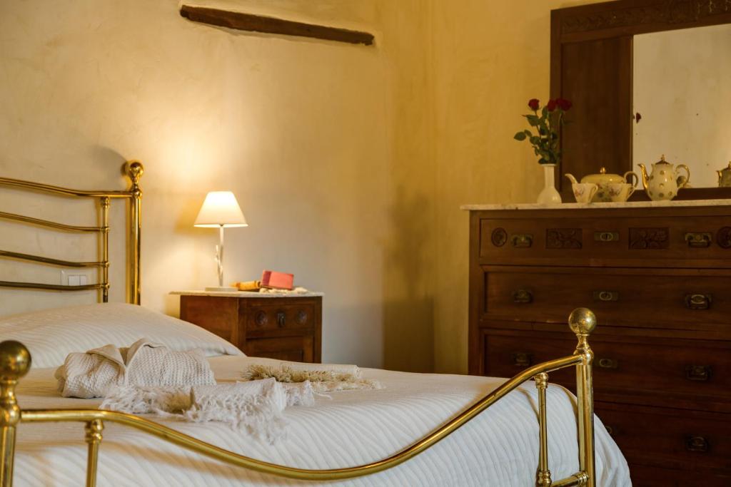 Postel nebo postele na pokoji v ubytování Agriturismo Le Canterie
