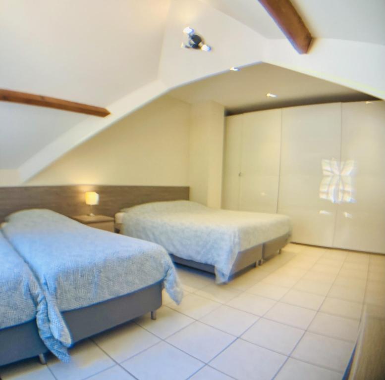 Ένα ή περισσότερα κρεβάτια σε δωμάτιο στο Beauval Chambre