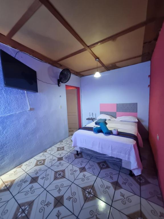 Postel nebo postele na pokoji v ubytování Hotel One Way Jocotenango