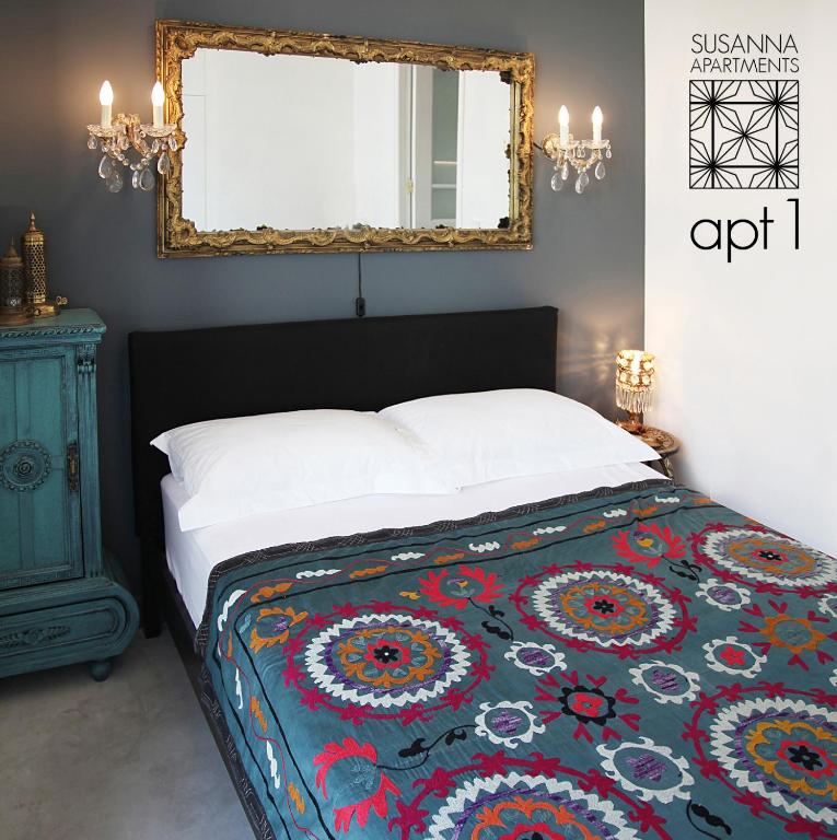 Posteľ alebo postele v izbe v ubytovaní Susanna Apartments - Your Oasis in Athens Ano Petralona