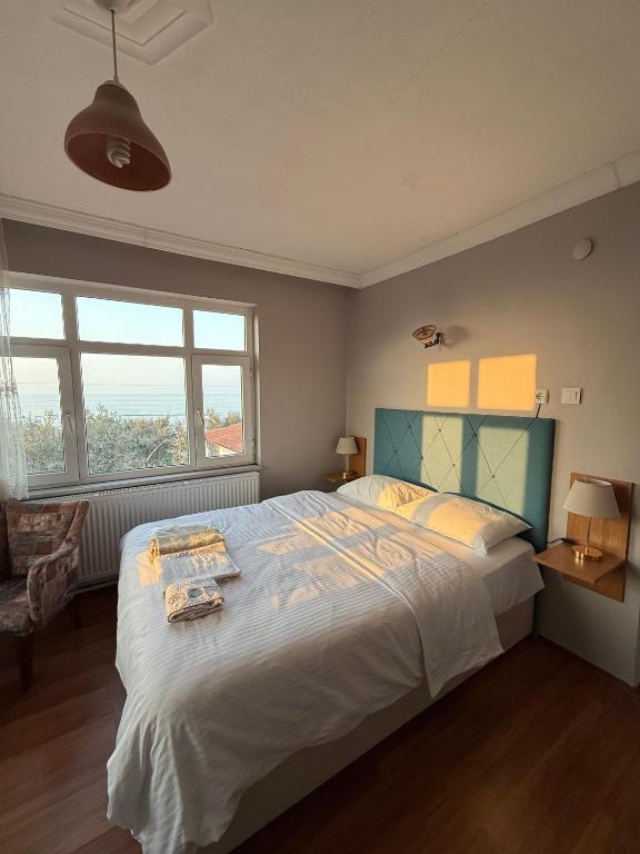 Postel nebo postele na pokoji v ubytování De La Terrasse IZNIK