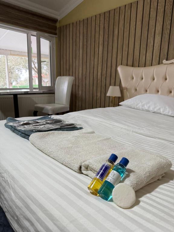 Postel nebo postele na pokoji v ubytování De La Terrasse IZNIK