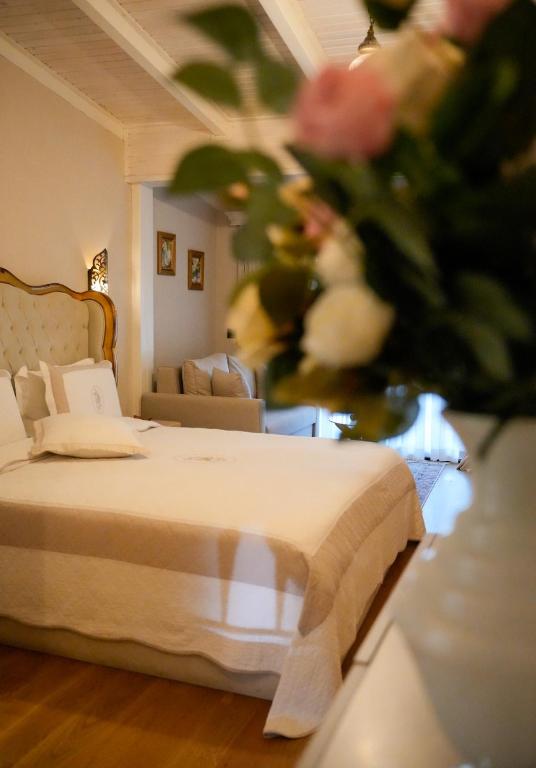 Postel nebo postele na pokoji v ubytování Le prince Rooms