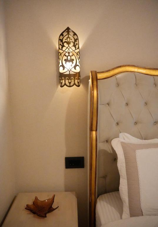 Postel nebo postele na pokoji v ubytování Le prince Rooms