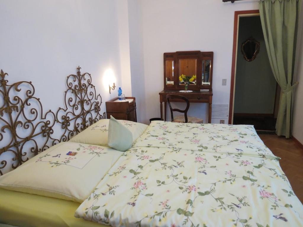 Postel nebo postele na pokoji v ubytování Villa Morissolina